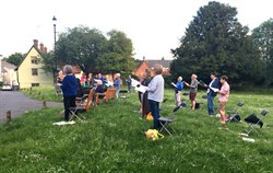 Outdoor choir rehearsal origin